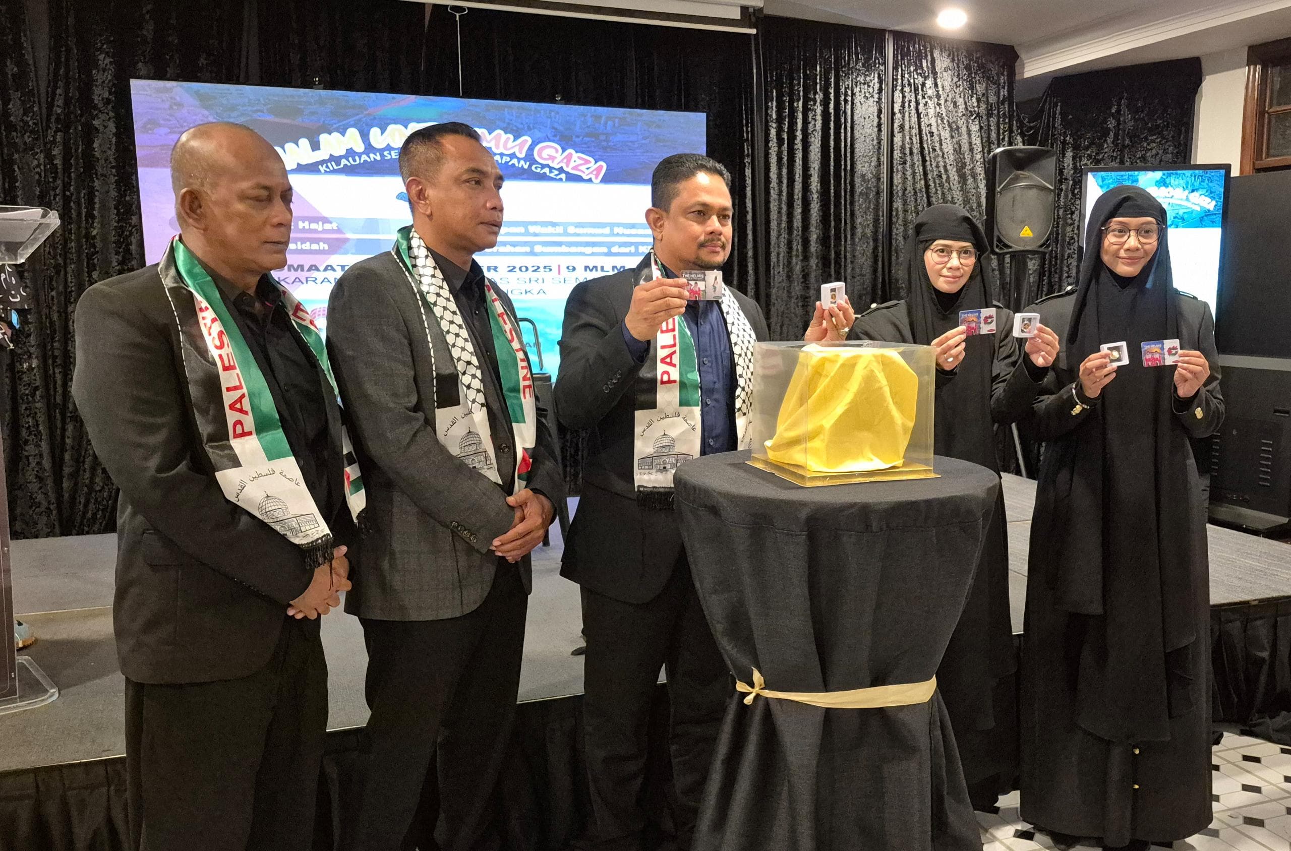 KESS Raikan “Malam Untukmu Gaza” – The Helmis Dilantik Duta Syiling Emas Khas ‘Untukmu Gaza’